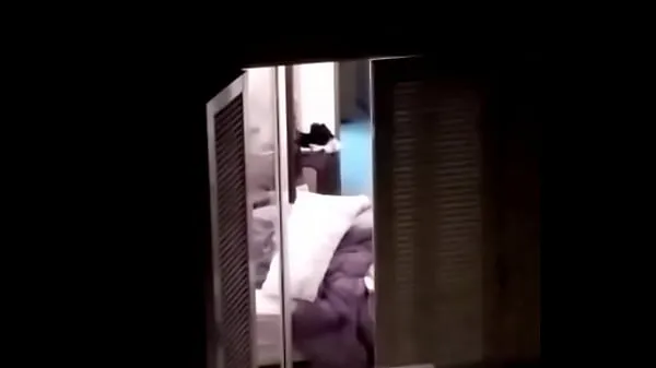 XXX Neighbor changes clothes with windows and curtains open energy Movies